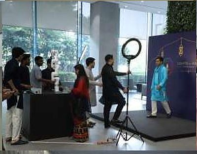 Employees at a festive photo booth during the Hyundai Diwali celebration