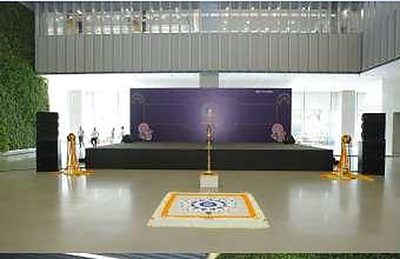 Diwali stage set against a living green wall in the Hyundai corporate office