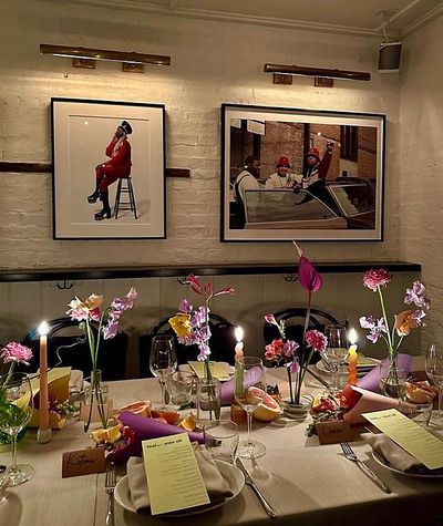 Intimate private dining room dressed with candlelight and spring florals